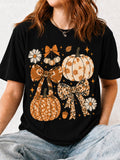 Casual Short Sleeve Pumpkin And Bow Print T-Shirt, Perfect For Fall And Halloween Featuring A Round Neck
